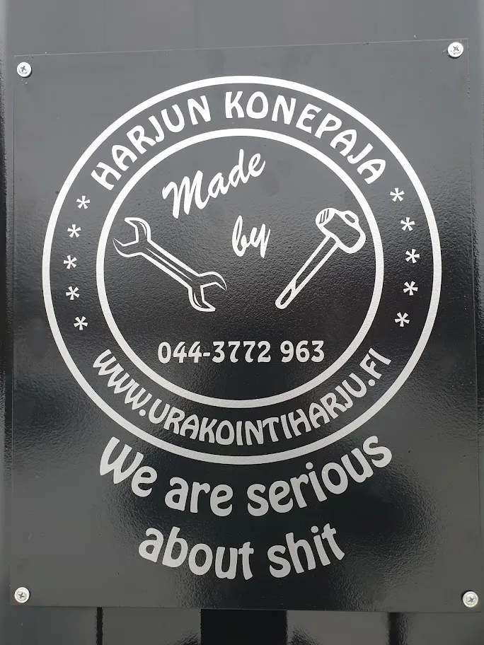 Harjun Konepaja logo showing a wrench and hammer with phone number 044-3772 963 and website www.urakointiharju.fi, with text We are serious about shit.